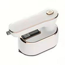 مكواة جافة كهربائية صغيرة محمولة باليد